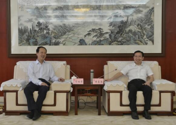 丁焰章拜會南昌市委副書記、市長黃喜忠